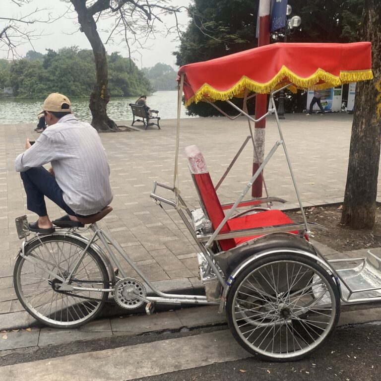 Tuk tuk rider, Hanoi, Vietnam