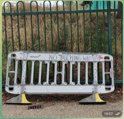 Traffic barrier, with graffiti